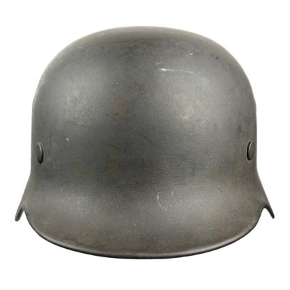 Original WWII German M40 ND helmet with battle damage 