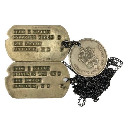Original WWII US dog tags with christian token