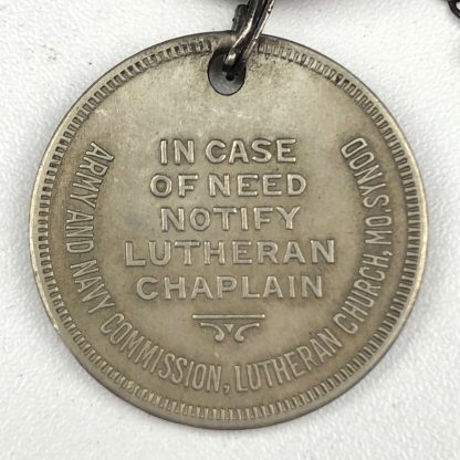 Original WWII US dog tags with christian token