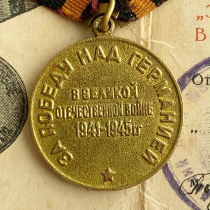 Original WWII Russian ‘Victory over Germany’ medal with citation