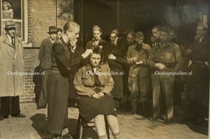 Original WWII Dutch liberation photo - An SS woman's hair is cut off