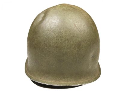 Original WWII US M1 early fixed bale helmet with battle damage