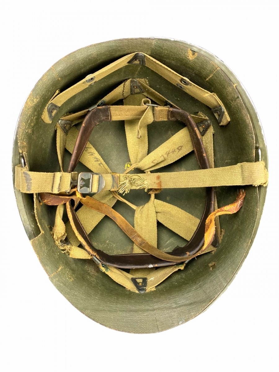 Original WWII US M1 early fixed bale helmet with battle damage ...