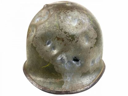 Original WWII US M1 helmet with battle damage