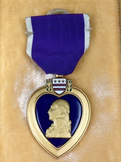 Original WWII US Purple Heart medal in box with ribbon