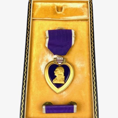 Original WWII US Purple Heart medal in box with ribbon