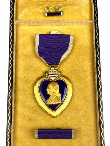 Original WWII US Purple Heart medal in box with ribbon and pin