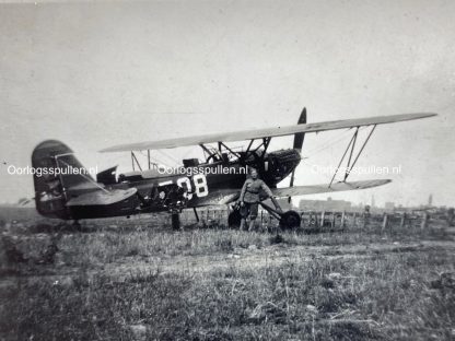 Original WWII Dutch photos - Battle damaged Fokker airplane
