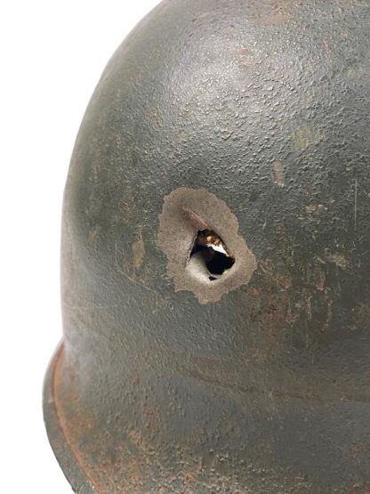 Original WWII US M1 helmet with bullet hole