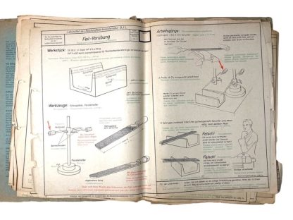 Original WWII German-Russian file with drawings to train Russian workers as metal aircraft builders
