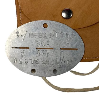 Original WWII German WH Erkennungsmarke with leather pouch of the 1./Infanterie-Ersatz-Bataillon 358