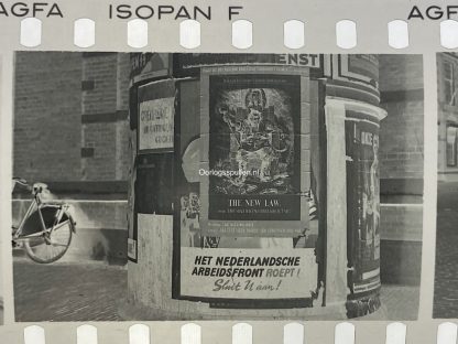 Original WWII Dutch photo negatives with collaboration posters