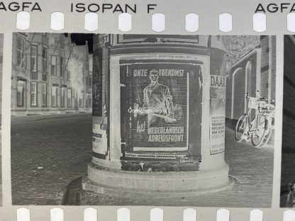 Original WWII Dutch photo negatives with collaboration posters