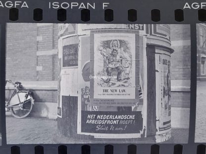 Original WWII Dutch photo negatives with collaboration posters