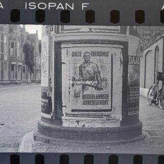 Original WWII Dutch photo negatives with collaboration posters