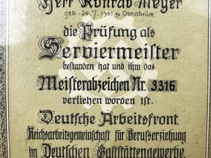 Original WWII German D.A.F. 'Serviesmeister' stickpin and citation
