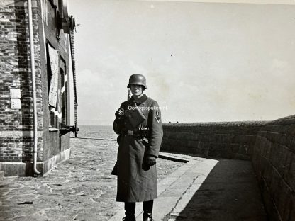 Original WWII German large size photo - German soldier in harbor in Denmark
