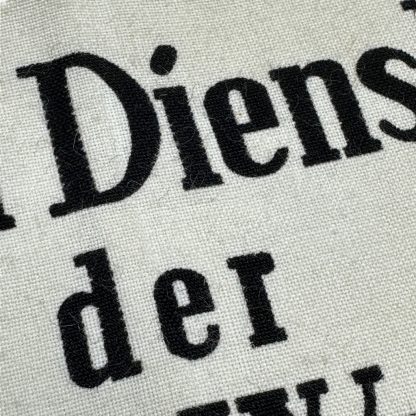 Original WWII German 'Im Dienst der Deutsche Wehrmacht' armband