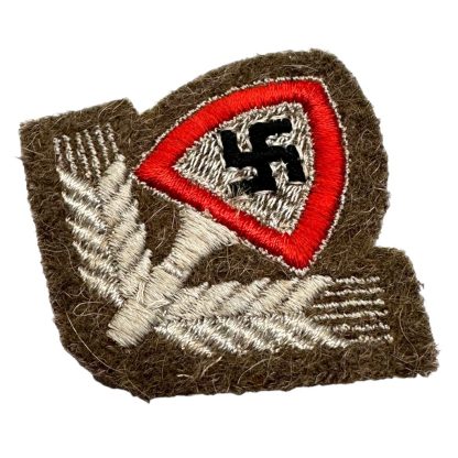 Original WWII German Reichsarbeitsdienst cap insignia