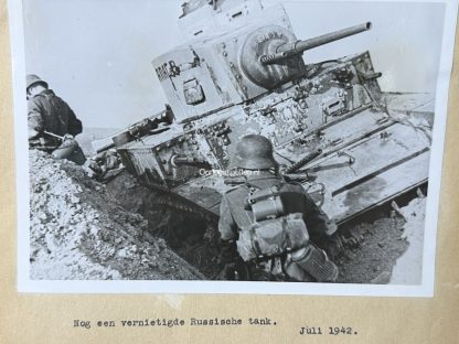 Original WWII German photo of a destroyed Russian tank
