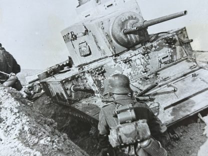 Original WWII German photo of a destroyed Russian tank