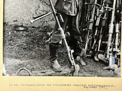 Original WWII German photo of German soldier with captured Russian PTRD-41 anti-tank rifles