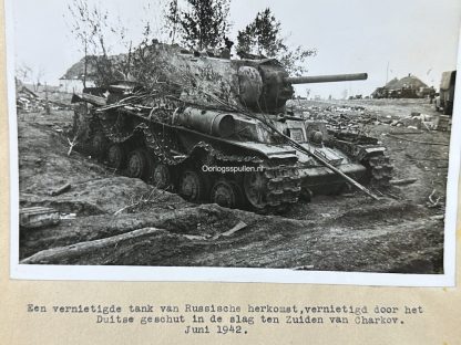 Original WWII German photo of a disabled Russian tank at the battle of Charkov
