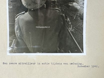 Original WWII German photo of a German MG34 with crew wearing camouflage helmets in action during an exercise