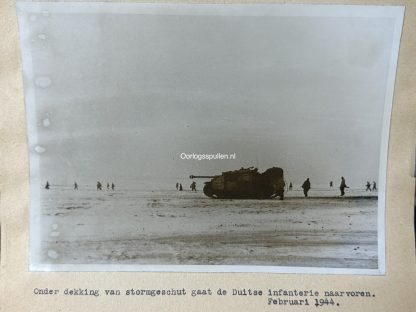 Original WWII German photo of a Sturmgeschutz with infantry in attack