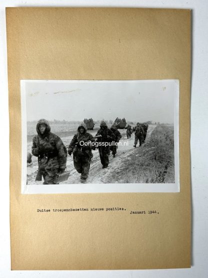 Original WWII German photo of German soldiers in camouflage clothing occupy new positions
