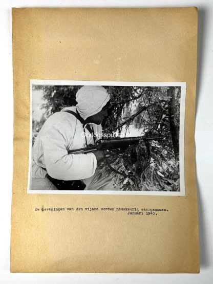 Original WWII German photo of a German soldier in winter camouflage clothing with MP40