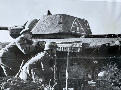 Original WWII German photo of a disabled Russian tank and German infantry