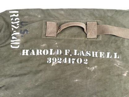 Name and army serial number on a US army duffle bag from World War II.