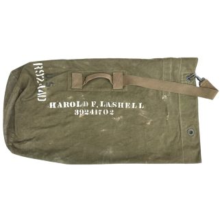 An original US army duffle bag from 1944 in World War II and it contains the soldiers name and serial number.