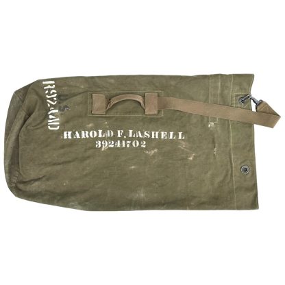 An original US army duffle bag from 1944 in World War II and it contains the soldiers name and serial number.