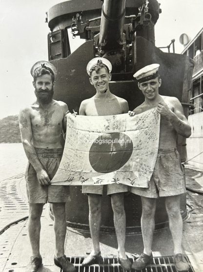 Original WWII British photo of the HMS Trident (N52) submarine crew with captured Japanese flag