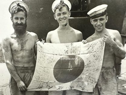 Original WWII British photo of the HMS Trident (N52) submarine crew with captured Japanese flag