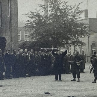 Original WWII Dutch liberation photo of collaborators getting arrested