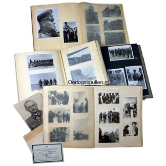 Photo albums with historical images of Field Marshal Erwin Rommel, featuring photos of military gatherings, portraits, and scenes from World War II. The albums include various black-and-white photos, including Rommel in uniform and different military activities, as well as some loose photos and his memorial card in an envelope.