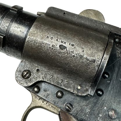 WWII British R.A.F. No. 4 MKI Webley & Scott flare gun, featuring a dark metal construction with a textured grip, short barrel, and clear engraving of the model and manufacturer, used by the Royal Air Force during World War II for signaling purposes.