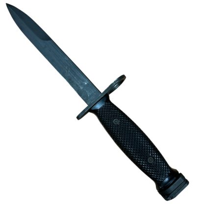 US M7 Colt bayonet from the Vietnam War, manufactured by Colt, featuring a black metal blade and a black plastic handle. Commonly used with the M16 rifle. Authentic military artifact with historical significance.