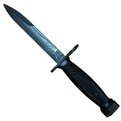 US M7 Colt bayonet from the Vietnam War, manufactured by Colt, featuring a black metal blade and a black plastic handle. Commonly used with the M16 rifle. Authentic military artifact with historical significance.