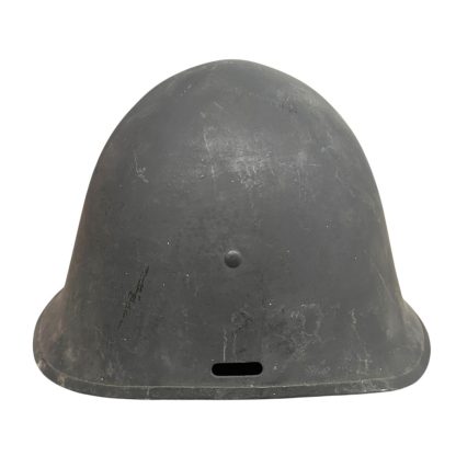 A WWII Danish M23/41 military helmet with a steel construction and a dark gray finish. The design features a rounded crown and a slightly flared brim for added protection. The surface shows light scratches and signs of wear, with a single central rivet visible at the front, indicating its attachment point for the internal liner.