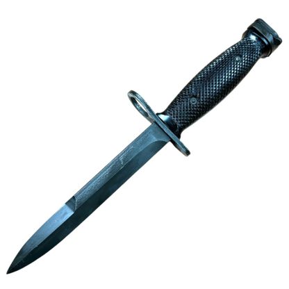 US M7 Colt bayonet from the Vietnam War, manufactured by Colt, featuring a black metal blade and a black plastic handle. Commonly used with the M16 rifle. Authentic military artifact with historical significance.