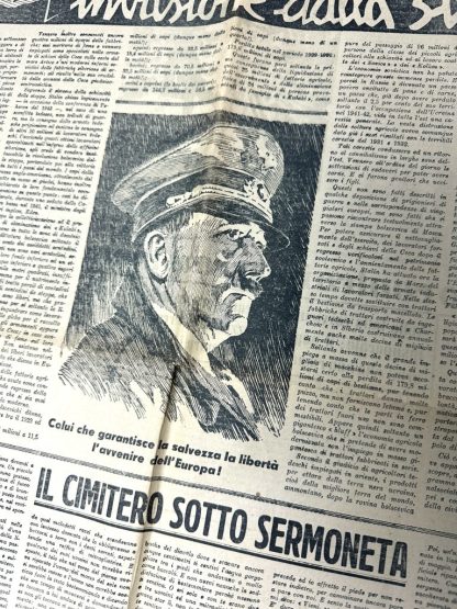 An illustration from an Italian World War II newspaper showing a profile portrait of a man in a military uniform, accompanied by the caption 'Colui che garantisce la salvezza, la libertà, l’avvenire dell’Europa!' ('He who guarantees the safety, freedom, and future of Europe!'). The text and imagery emphasize propaganda themes promoting leadership and fascist ideology. Below the illustration is another headline, 'Il Cimitero sotto Sermoneta' ('The Cemetery under Sermoneta'), suggesting additional articles focused on wartime narratives.