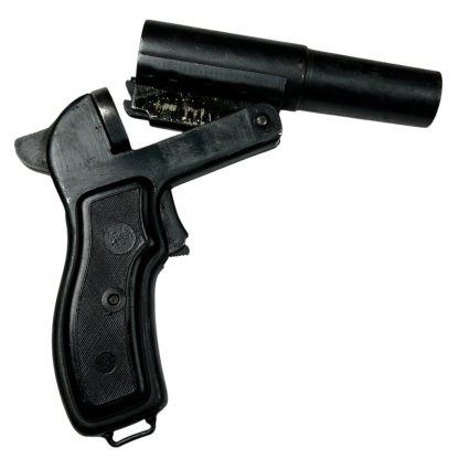 Russian SPSh-44 flare gun from World War II, constructed from black metal with a distinctive cylindrical barrel and ergonomic grip, preserved in original condition as a historical artifact.