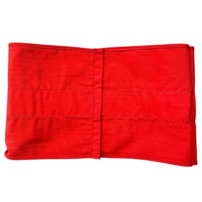 A historical Hitler Youth armband from World War II, made of red cotton with a white central section featuring a black swastika inside a circle.