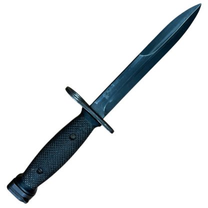 US M7 Colt bayonet from the Vietnam War, manufactured by Colt, featuring a black metal blade and a black plastic handle. Commonly used with the M16 rifle. Authentic military artifact with historical significance.