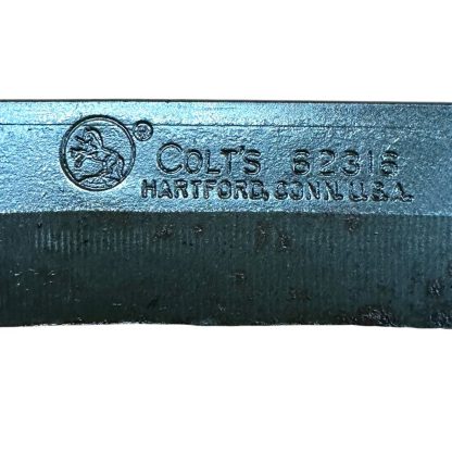 This close-up image shows the stamp on the blade of an M7 bayonet, indicating it was manufactured by Colt's Manufacturing Company in Hartford, Connecticut, USA. The marking "Colt's 62316" suggests that this is an official Colt-produced bayonet, which adds historical and collector's value. Colt's connection to the M7 bayonet is significant due to their role in producing weapons and accessories for the U.S. military.