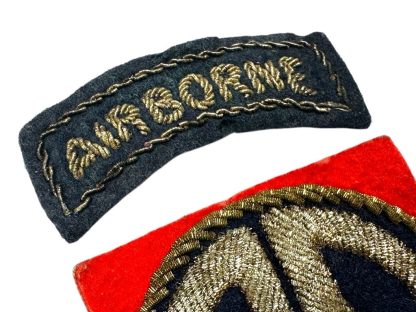 A World War II-era U.S. 82nd Airborne Division bullion patch, British-made. The patch consists of a curved black tab with 'AIRBORNE' embroidered in gold bullion thread and a square red patch featuring a gold bullion 'AA' insignia on a dark blue background, surrounded by gold braiding.